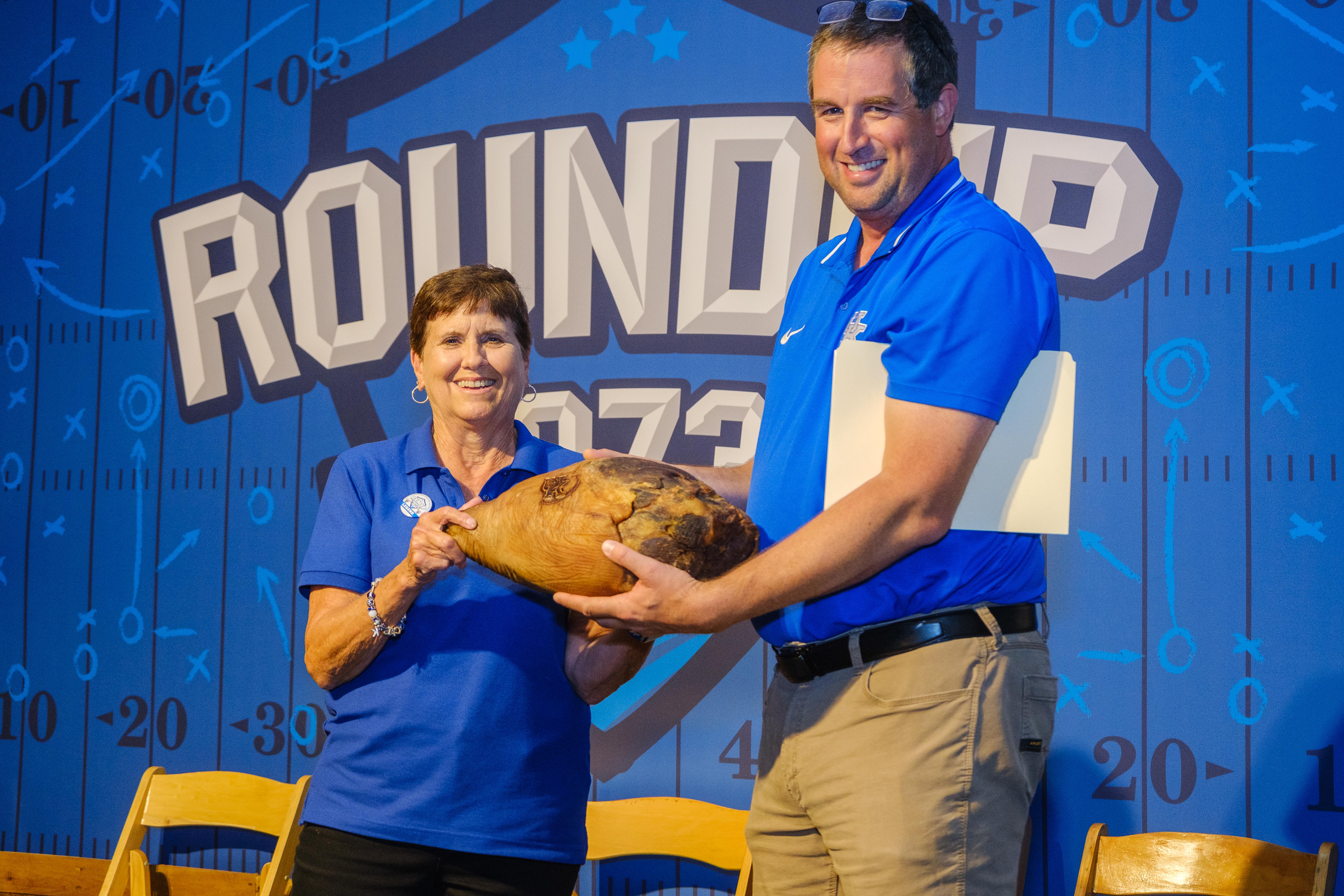 Dr. Radcliffe received a prize ham from Dr. Aaron.