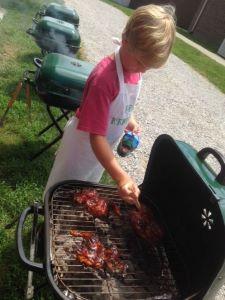 4-Her Participating in a Chicken Barbecue Camp